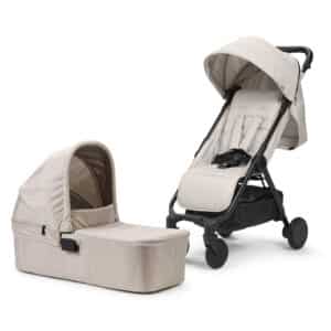 Vauvan vaunut ja lasten rattaat samassa setissä.